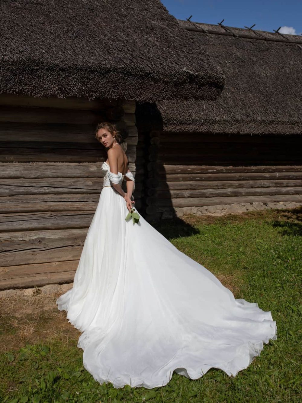 White Silk wedding dress Lira in an A-line silhouette with a sweetheart neckline and front bodice draping