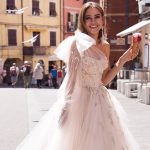 Popular blush colour wedding dress Gretta by Ange Etoiles has dramatic tulle bow and long sleeve on one shoulder, princess puffy skirt and long tulle train, image 4