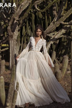 boho lace wedding dress Hori by Rara Avis. It has A-line lace skirt, long lace sleeves and open back with tassels, image 5
