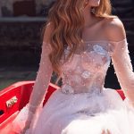 Kenzi wedding dress by Ange Etoiles with pearl and lace top, tulle A-line soft skirt and long bell sleeves image 2