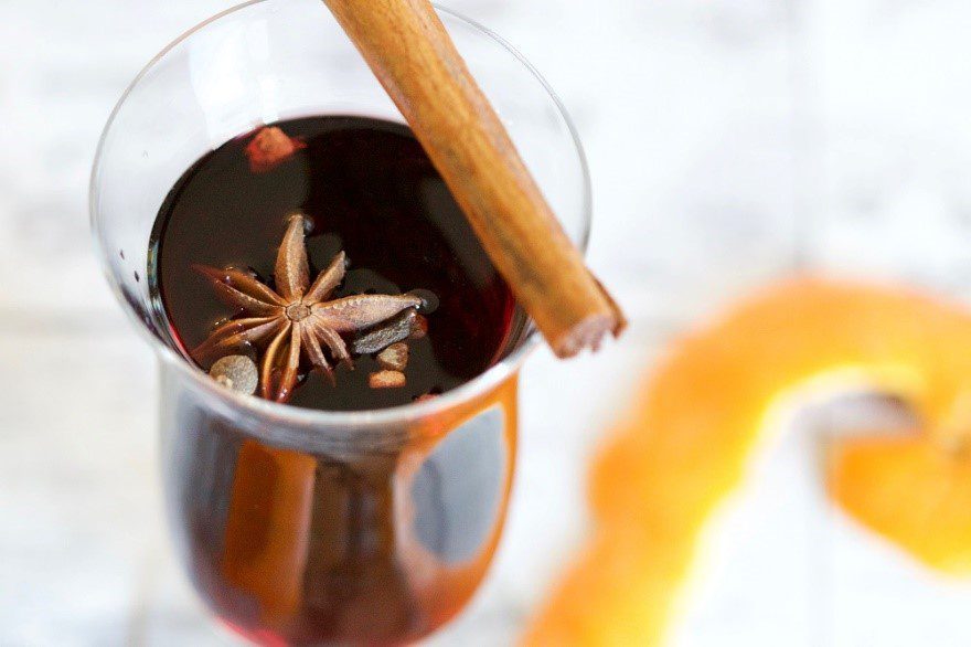 Delicious mulled spice wine with a cinnamon stick on top