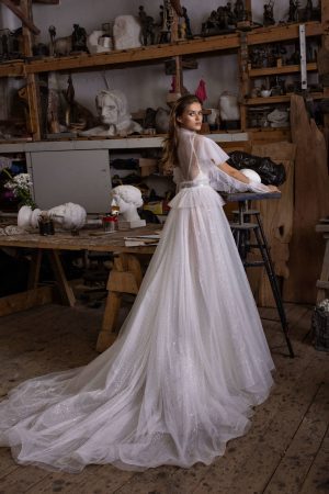 Wedding dress Letrin with Long Sleeves available from Dell'Amore Bridal