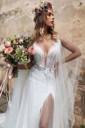 Sexy wedding dress Afina with skirt split, deep neckline and wedding cape by Ange Etoiles, image 3