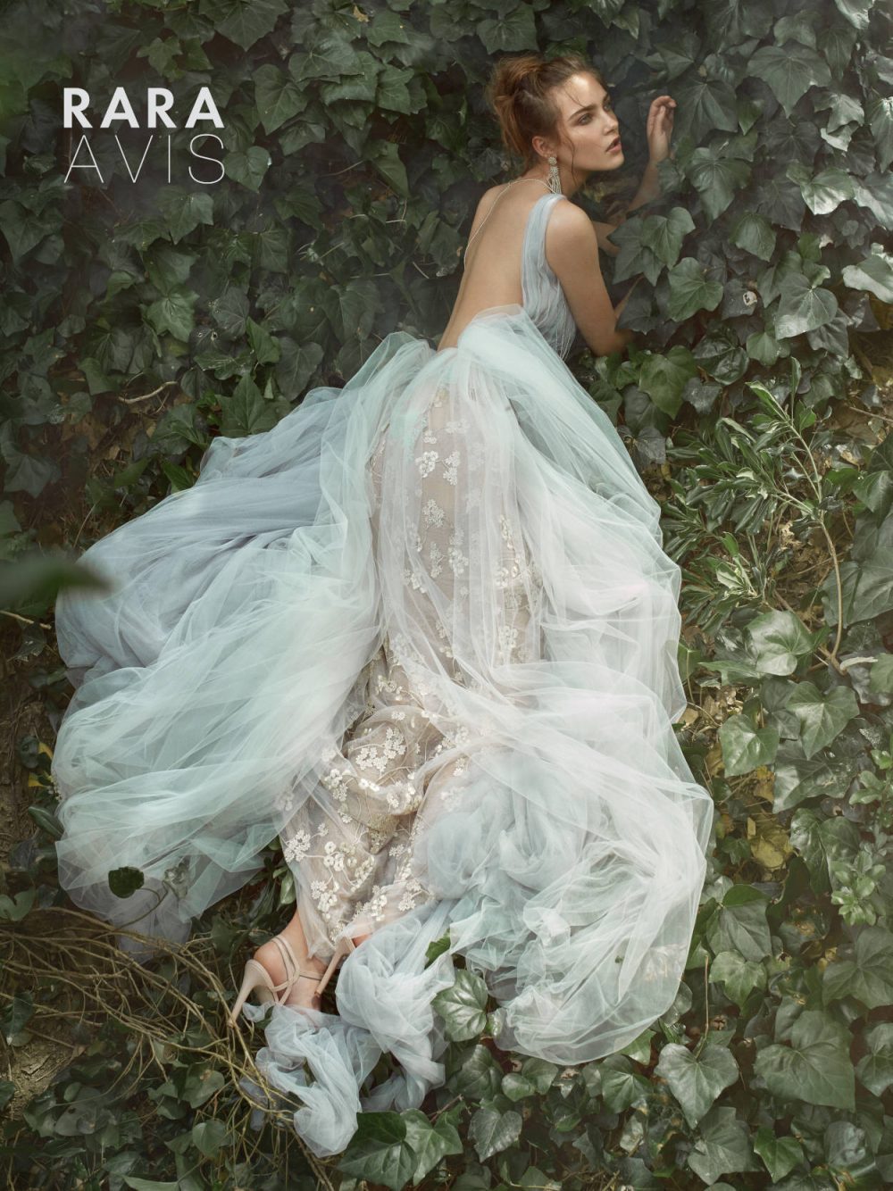 floral blue wedding gown Alize by Rara Avis with tulle skirt on the sides and gold flower decorations, image 4