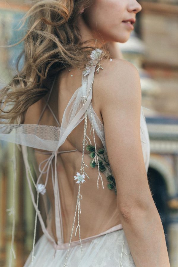 dusty blue wedding dress Lofgrein by Rara Avis with flower straps, wings and crisscross straps on the back, image 3