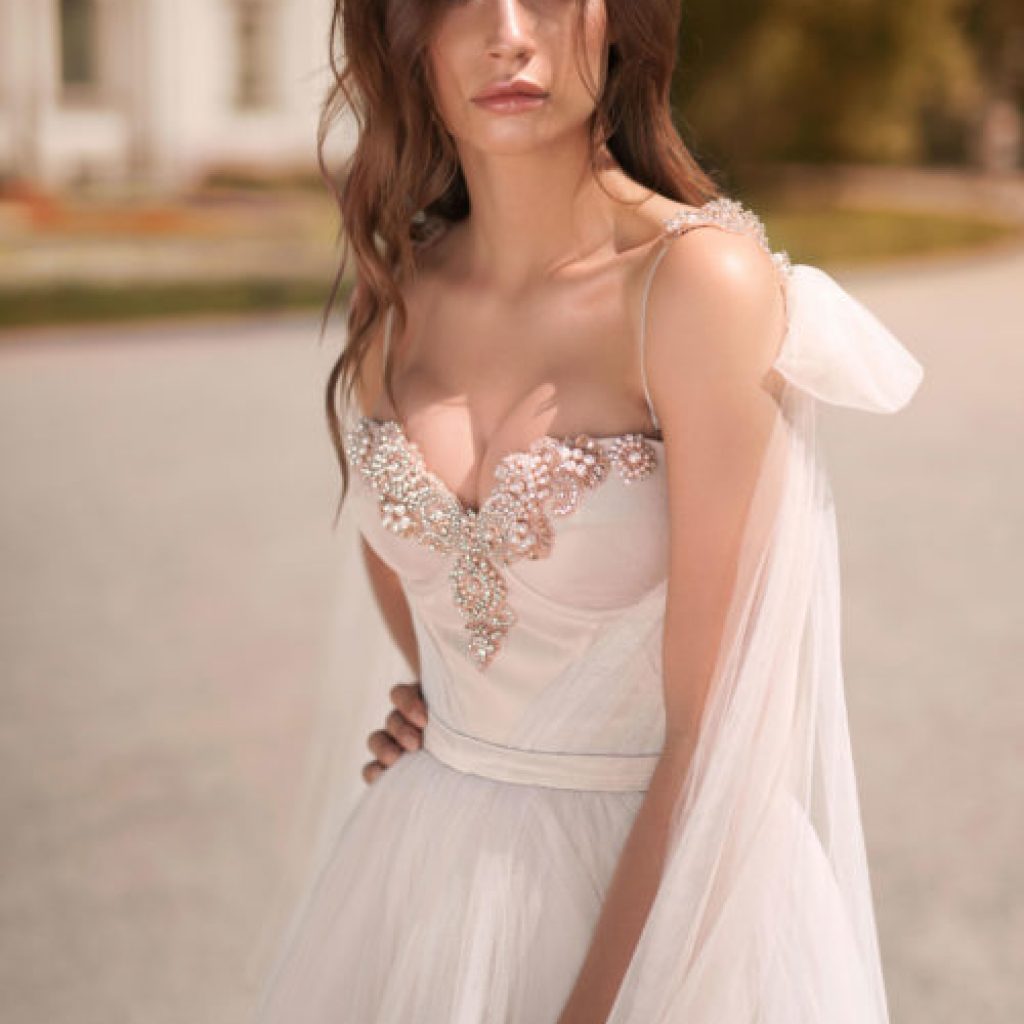 Sexy blush wedding gown Nora by Blammo-Biamo with wing sleeves and bodice cups decorated with blush crystals, image 2