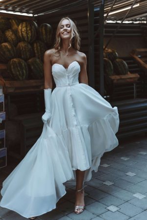short white wedding dress in A-line midi silhouette