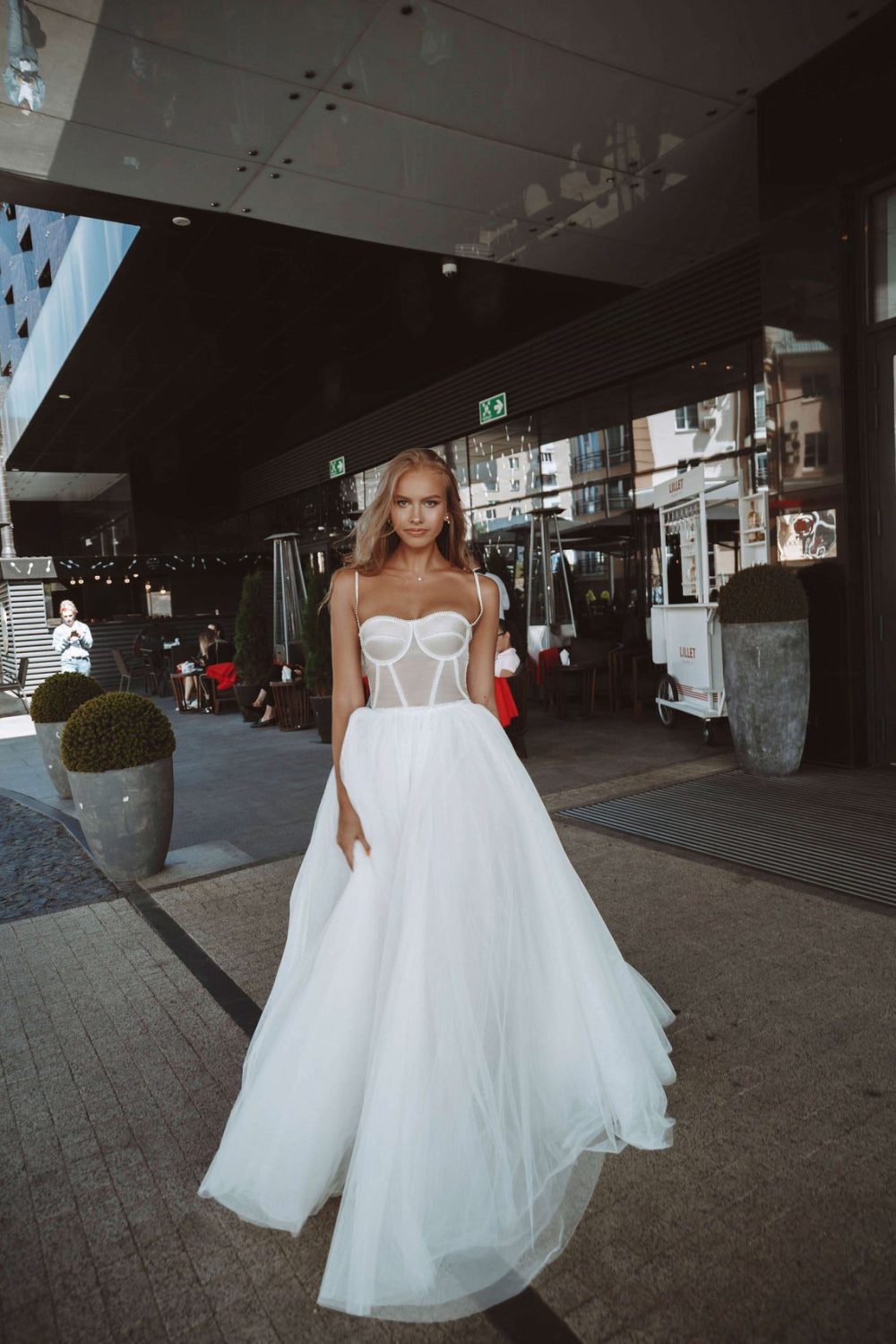 Rara Avis elegant A-line wedding dress Yang with the tulle skirt and fitted bodice with the sweetheart neckline and pearls decorations at Dell"Amore Bridal, NZ.6