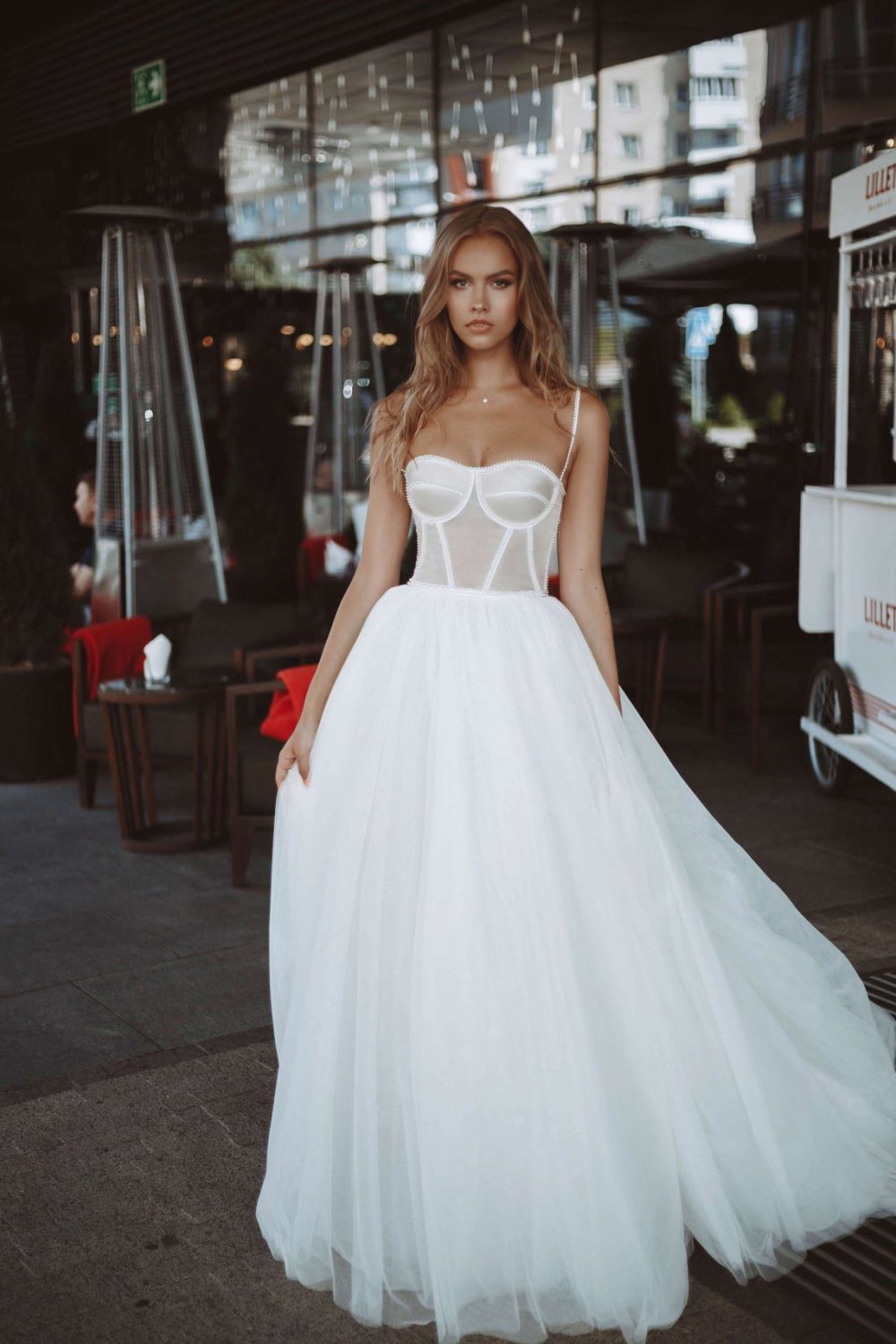 Rara Avis elegant A-line wedding dress Yang with the tulle skirt and fitted bodice with the sweetheart neckline and pearls decorations at Dell"Amore Bridal, NZ.1