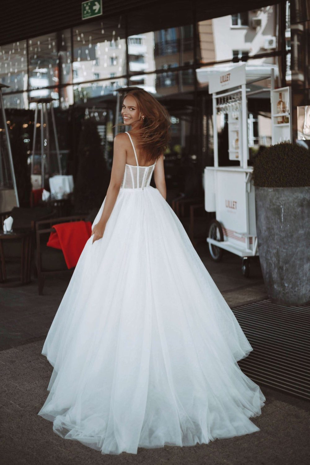 Rara Avis elegant A-line wedding dress Yang with the tulle skirt and fitted bodice with the sweetheart neckline and pearls decorations at Dell"Amore Bridal, NZ.2