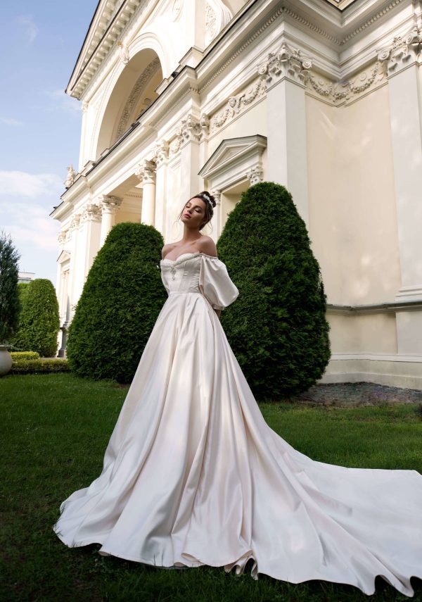 princess wedding dress Medea from Blammo-biamo, simple and modern style bridal gown with off-shoulders sleeves, image 2