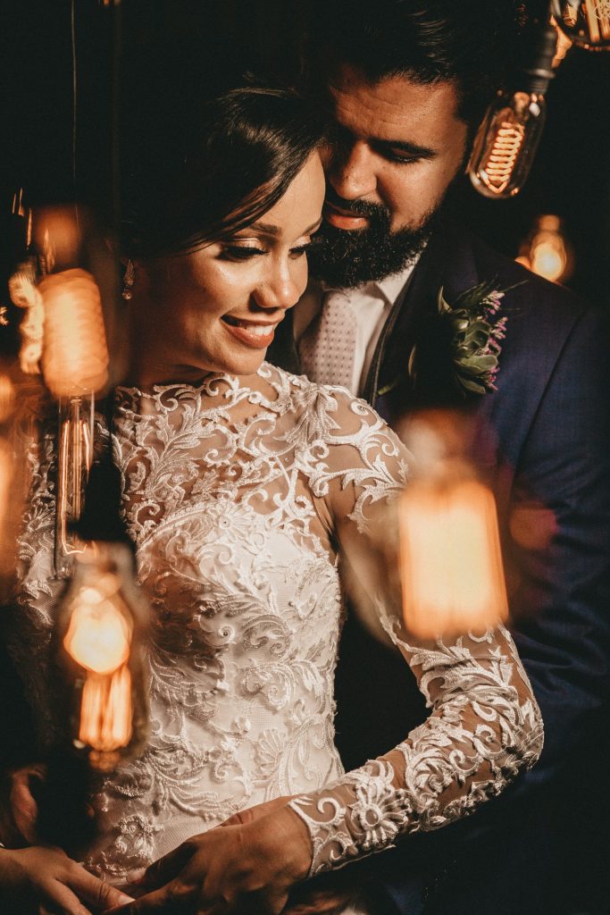A Mexican bride wearing her white and lace wedding dress 