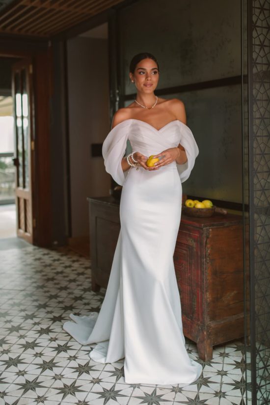 white simple satin wedding dress Vetta with fitted silhouette and organza off-shoulder sleeves by rara avis 4