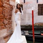 Simple satin fitted silhouette Claudia wedding dress by Oksana Mukha. 1