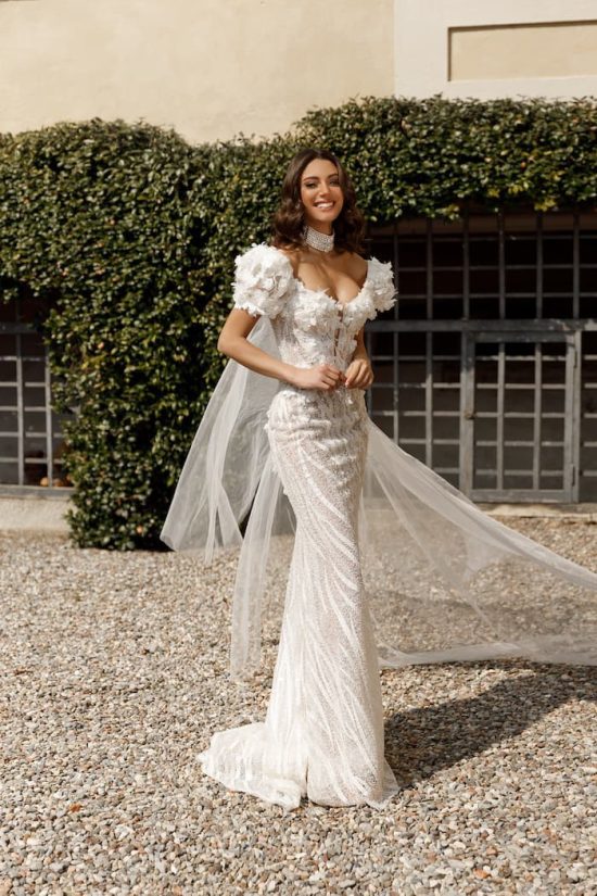 Fitted silhouette Eva wedding dress by Oksana Mukha with shoulder-off straps and detachable sleeves wings. 1