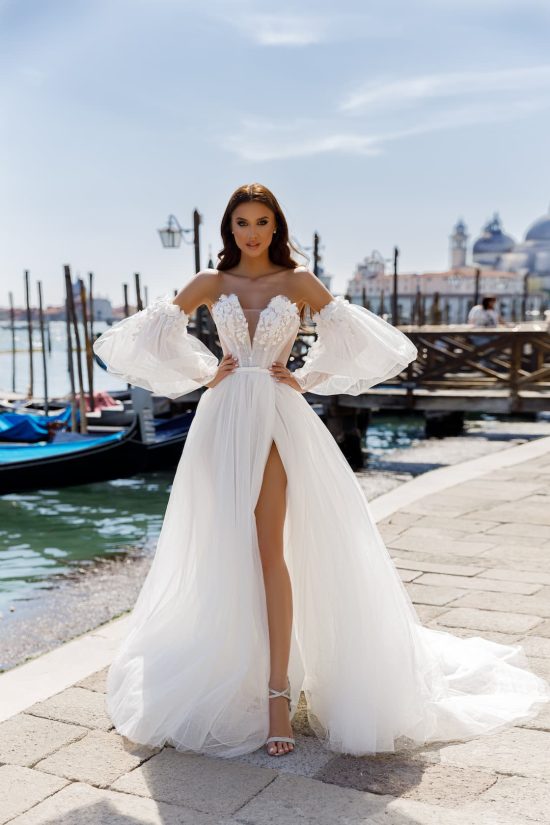 white tulle Charmaine wedding dress with slit and removable sleeves by oksana mukha 2