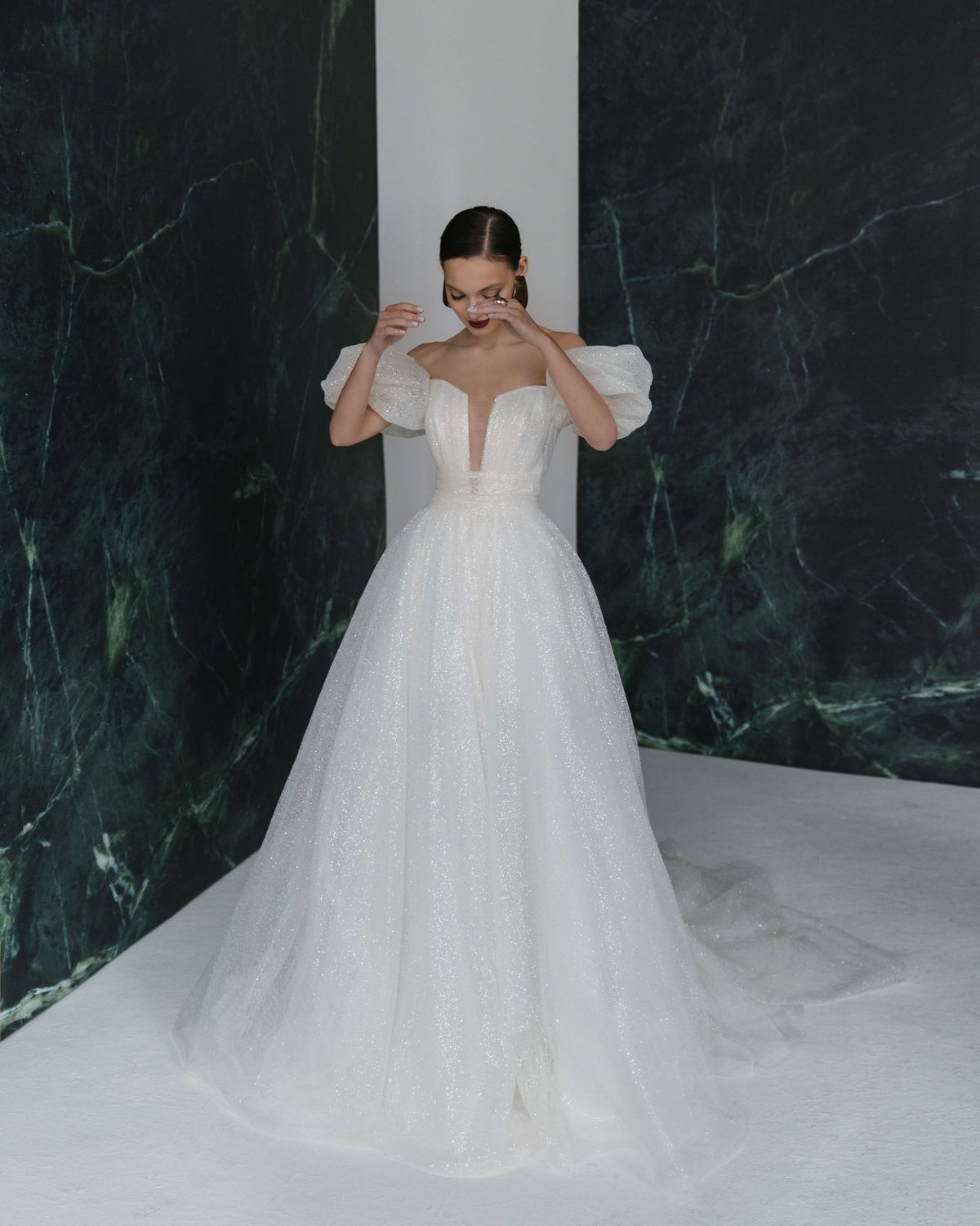 A-silhouette wedding dress with glitter, sleeves and a bow by rara avis. 5