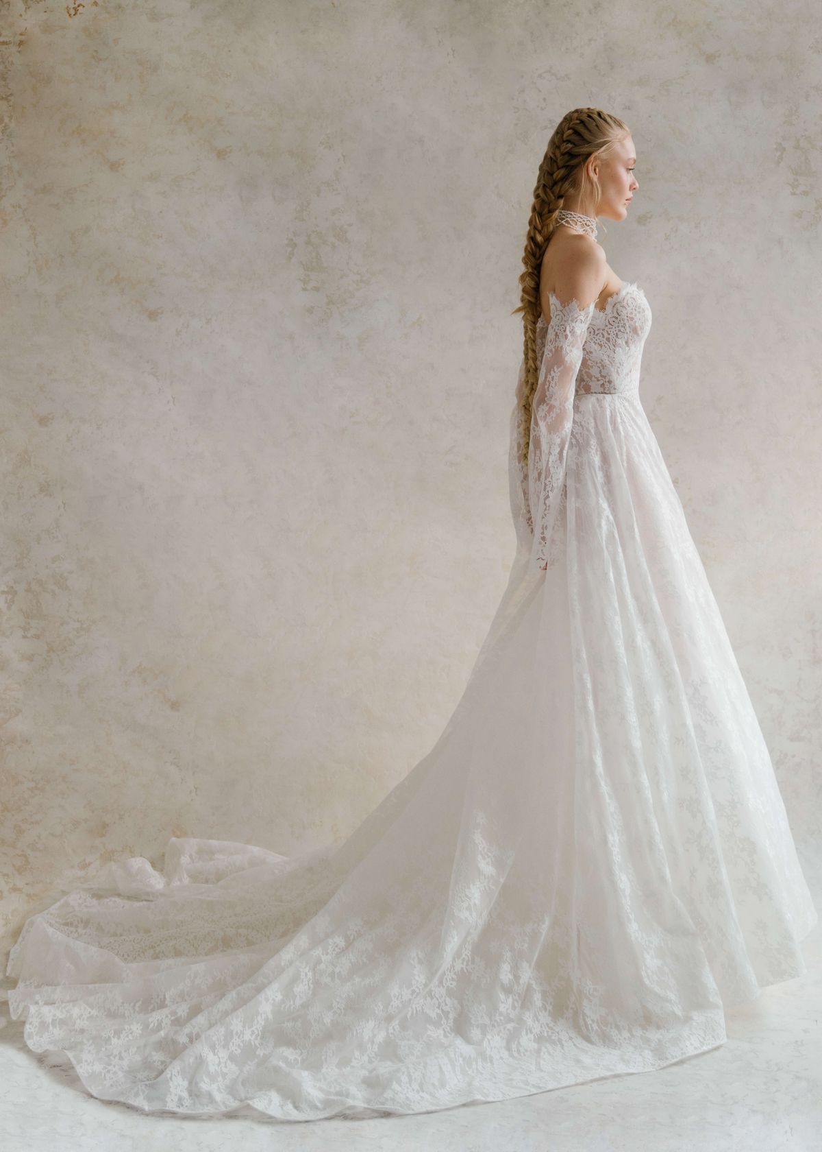 A-silhouette couture lace wedding dress with removable long sleeves at Dell'Amore , Auckland, NZ. 10