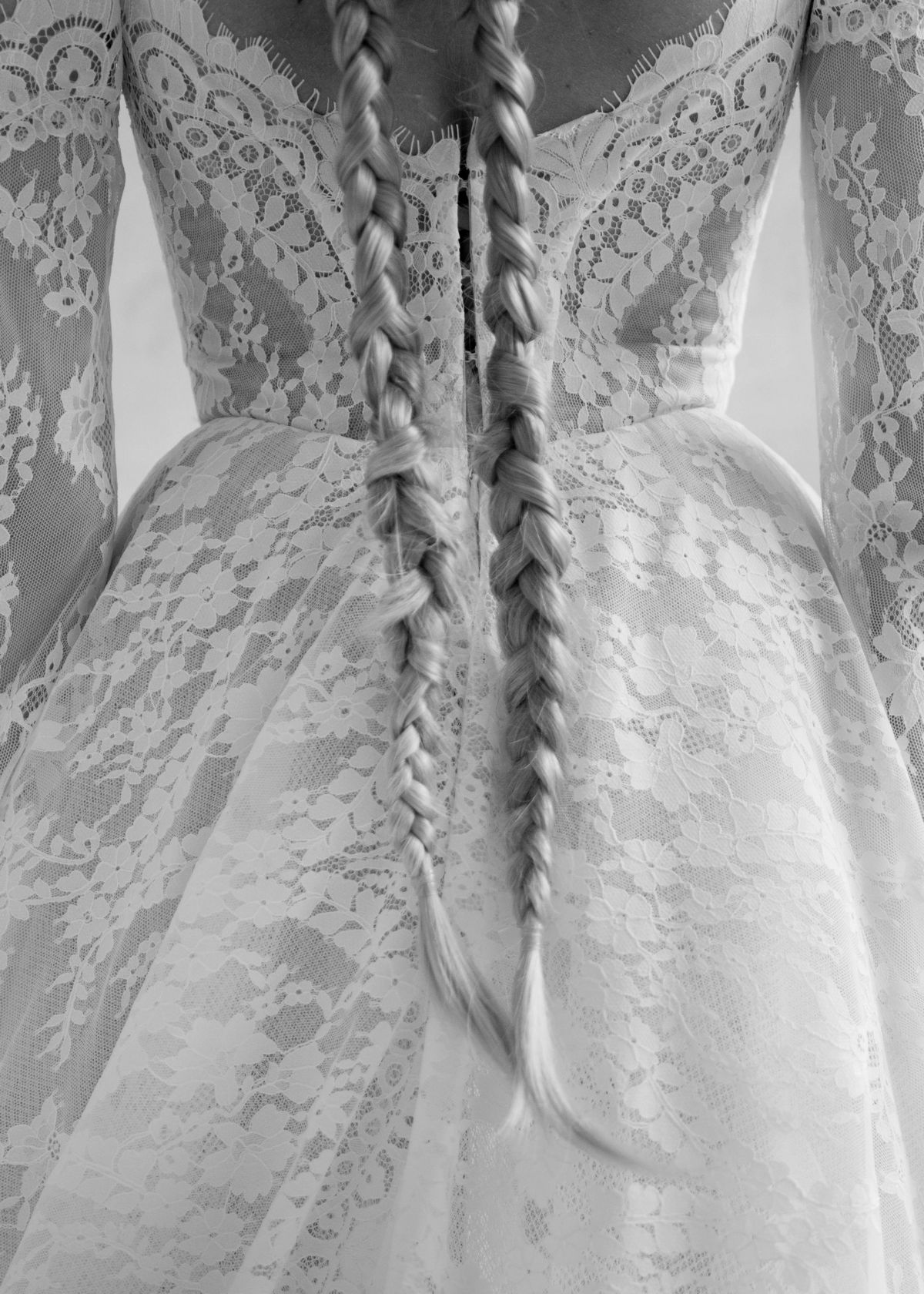 A-silhouette couture lace wedding dress with removable long sleeves at Dell'Amore , Auckland, NZ. 8