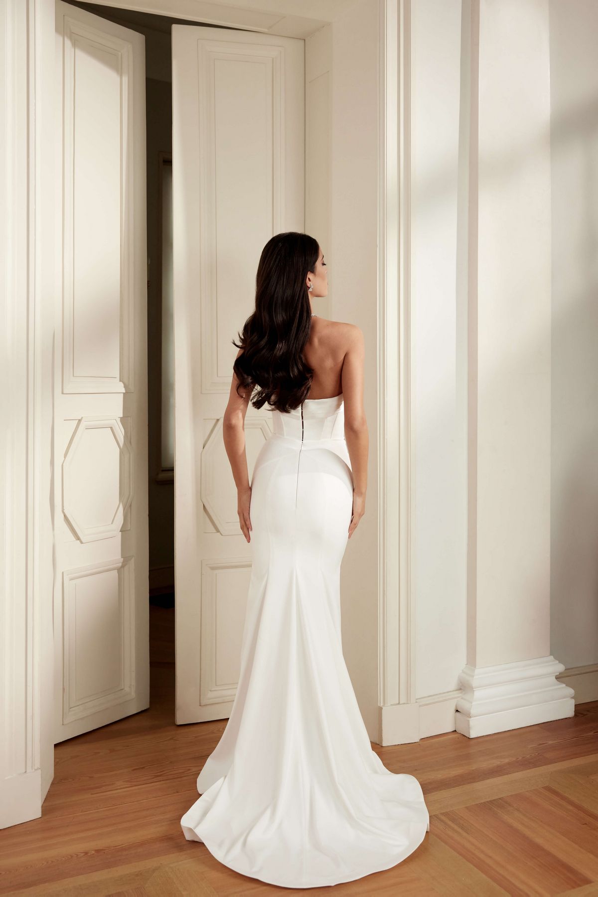 White mermaid simple wedding dress with detachable bow on the back by blammo biamo. 2
